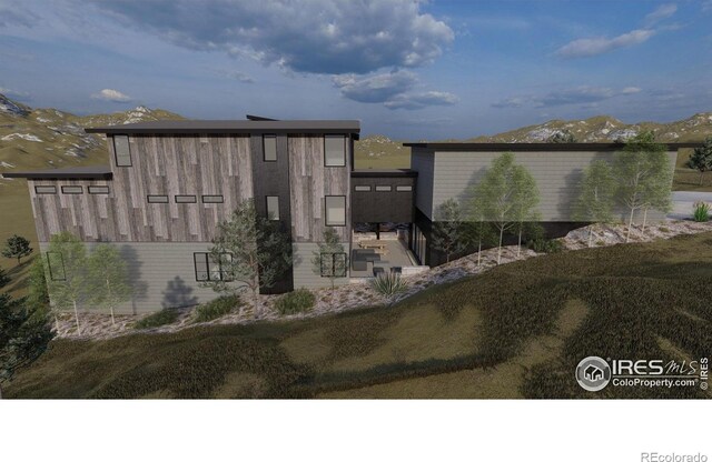 4402 Kano Dr, Fort Collins, CO 80526 - view of building exterior with a mountain view