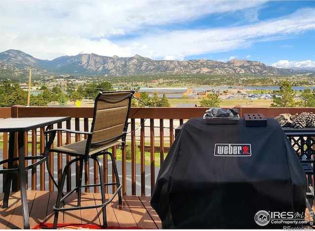 1443 Matthew Cir, Estes Park, CO 80517 - wooden deck with a mountain view and area for grilling