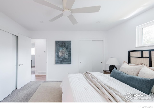 4601 S Lipan St, Englewood, CO 80110 - bedroom featuring multiple windows, carpet flooring, a closet, and a ceiling fan