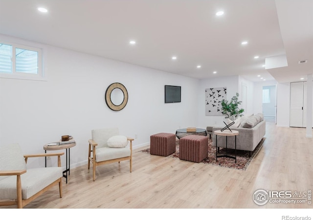 4601 S Lipan St, Englewood, CO 80110 - living room featuring wood finished floors, recessed lighting, and baseboards