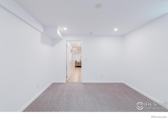 4601 S Lipan St, Englewood, CO 80110 - finished basement with carpet floors, baseboards, and recessed lighting