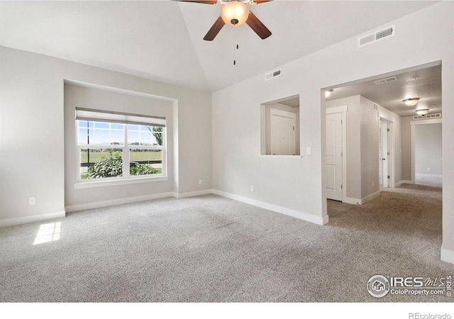 4902 Brookfield Dr Unit F, Fort Collins, CO 80528 - spare room with carpet flooring, a ceiling fan, vaulted ceiling, and baseboards