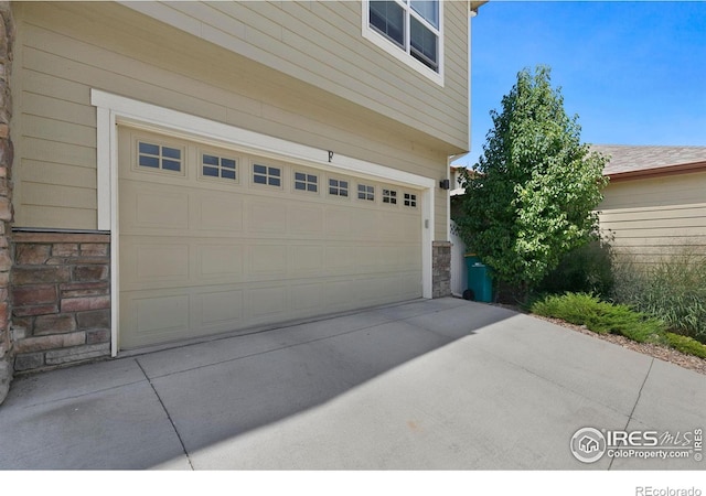 4902 Brookfield Dr Unit F, Fort Collins, CO 80528 - garage with driveway