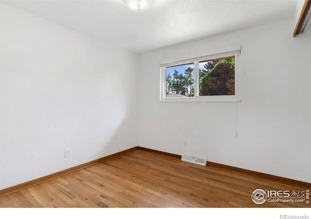 1229 Juniper St, Longmont, CO 80501 - empty room with baseboards and light wood-type flooring