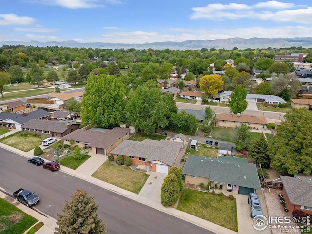1229 Juniper St, Longmont, CO 80501 - aerial perspective of suburban area with a mountain backdrop