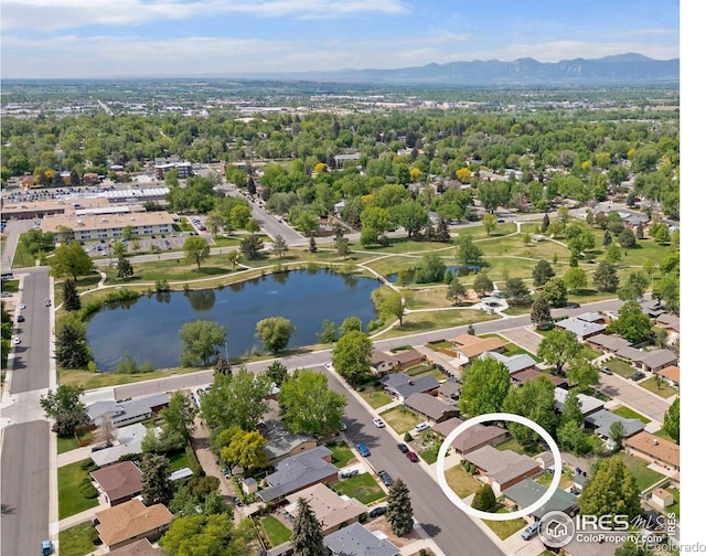 1229 Juniper St, Longmont, CO 80501 - drone / aerial view of a water and mountain view