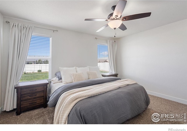 1566 Driftline Dr, Severance, CO 80550 - carpeted bedroom with baseboards and ceiling fan