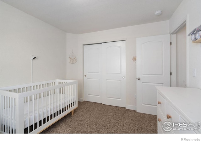 1566 Driftline Dr, Severance, CO 80550 - bedroom featuring carpet floors, a closet, baseboards, and a nursery area