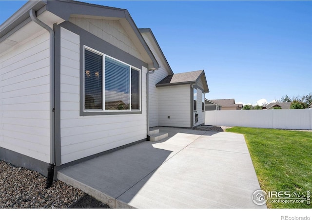 1566 Driftline Dr, Severance, CO 80550 - back of property with a patio area