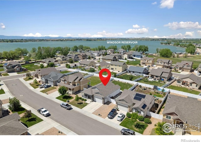 1566 Driftline Dr, Severance, CO 80550 - aerial perspective of suburban area with a large body of water