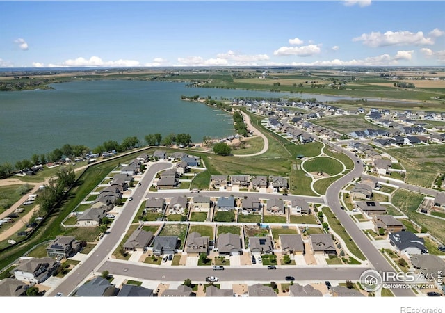 1566 Driftline Dr, Severance, CO 80550 - aerial view of property and surrounding area featuring a nearby body of water and nearby suburban area