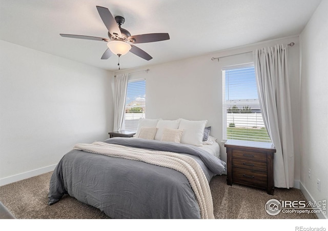 1566 Driftline Dr, Severance, CO 80550 - carpeted bedroom with baseboards and a ceiling fan