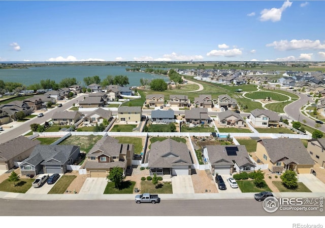 1566 Driftline Dr, Severance, CO 80550 - aerial perspective of suburban area with a large body of water