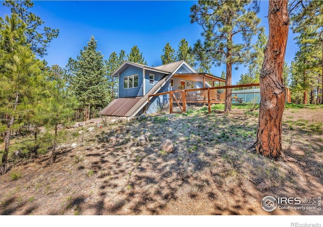 453 Black Fawn Ln, Westcliffe, CO 81252 - chalet / cabin featuring a deck and metal roof