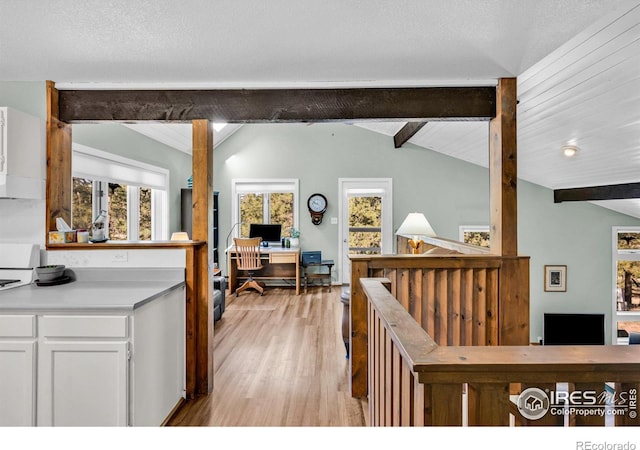 453 Black Fawn Ln, Westcliffe, CO 81252 - kitchen with an office area, white cabinets, light wood-style floors, and light countertops