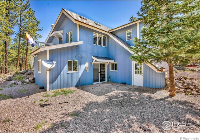 453 Black Fawn Ln, Westcliffe, CO 81252 - rear view of house with metal roof