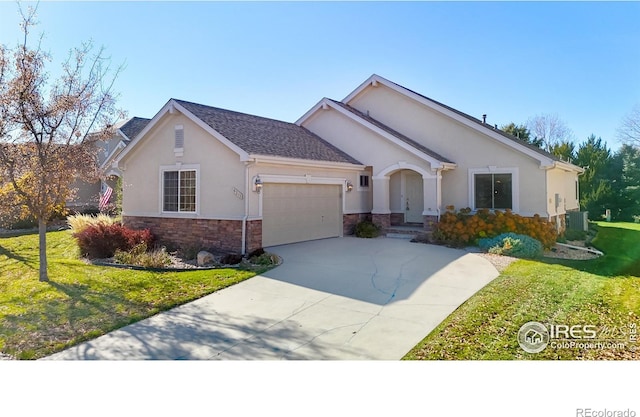 8211 Lighthouse Lane Ct, Windsor, CO 80528 - single story home with stucco siding, a garage, a front lawn, driveway, and stone siding