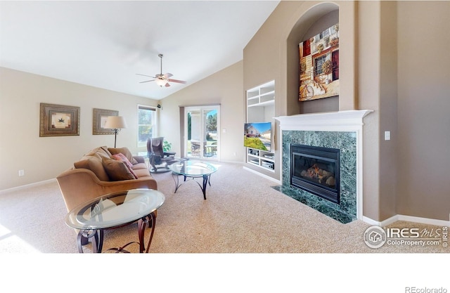 8211 Lighthouse Lane Ct, Windsor, CO 80528 - carpeted living area featuring a fireplace, baseboards, lofted ceiling, and a ceiling fan