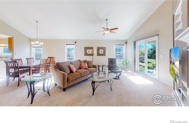 8211 Lighthouse Lane Ct, Windsor, CO 80528 - living area with light colored carpet, healthy amount of natural light, and high vaulted ceiling