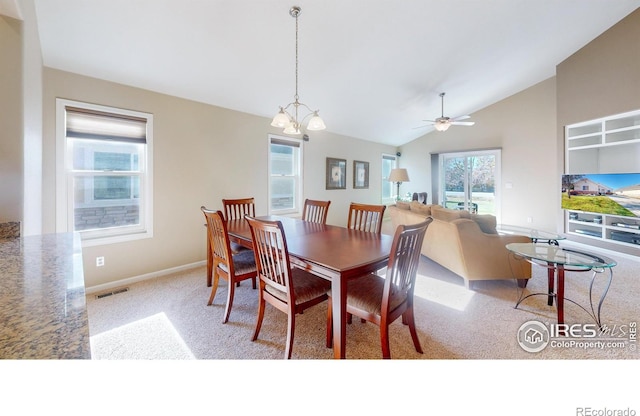 8211 Lighthouse Lane Ct, Windsor, CO 80528 - carpeted dining space featuring lofted ceiling, a ceiling fan, and baseboards