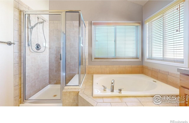 8211 Lighthouse Lane Ct, Windsor, CO 80528 - full bathroom featuring a bath and a shower stall