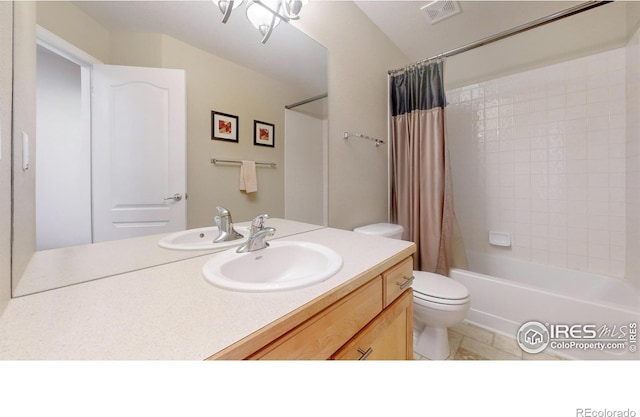 8211 Lighthouse Lane Ct, Windsor, CO 80528 - bathroom with vanity, toilet, shower / bathtub combination with curtain, and tile patterned flooring