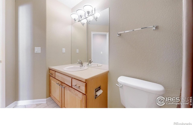 8211 Lighthouse Lane Ct, Windsor, CO 80528 - bathroom featuring toilet and vanity