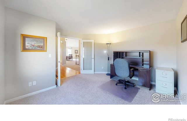 8211 Lighthouse Lane Ct, Windsor, CO 80528 - office with carpet flooring, baseboards, and french doors