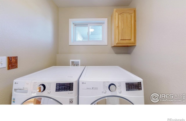 8211 Lighthouse Lane Ct, Windsor, CO 80528 - laundry room featuring separate washer and dryer and cabinet space