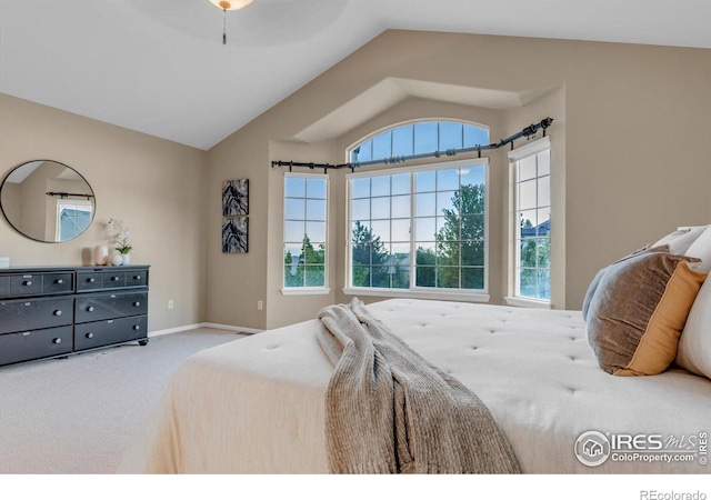 2841 Silver Pl, Superior, CO 80027 - carpeted bedroom with vaulted ceiling, baseboards, and a ceiling fan