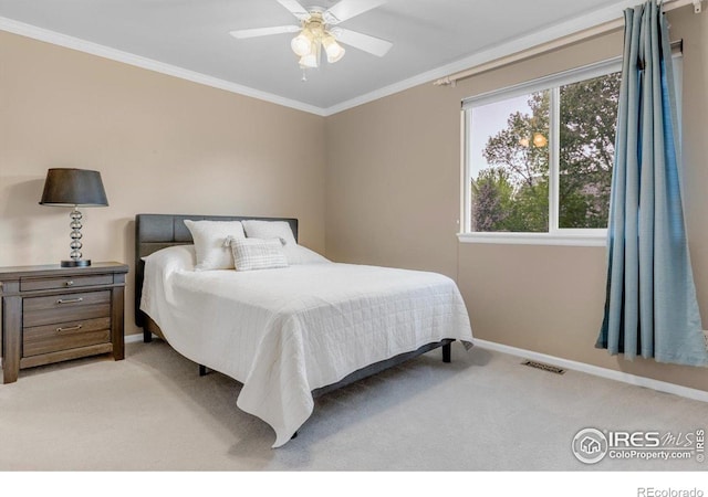 2841 Silver Pl, Superior, CO 80027 - bedroom with light carpet, crown molding, baseboards, and a ceiling fan