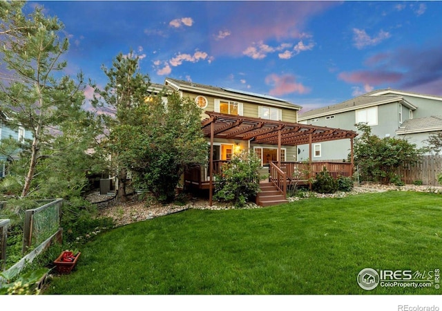 2841 Silver Pl, Superior, CO 80027 - back of house at dusk featuring a pergola, a deck, and solar panels