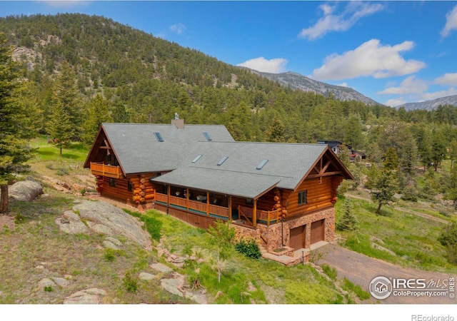 95 Choctaw Rd, Lyons, CO 80540 - view from above of property featuring a heavily wooded area and mountains