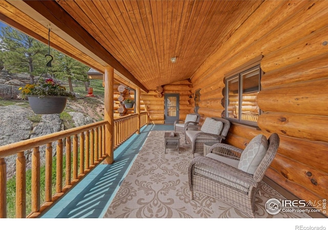 95 Choctaw Rd, Lyons, CO 80540 - covered porch with an outdoor hangout area