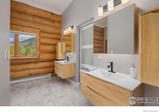 95 Choctaw Rd, Lyons, CO 80540 - bathroom featuring a baseboard heating unit, rustic walls, marble look tiles, two vanities, and baseboards