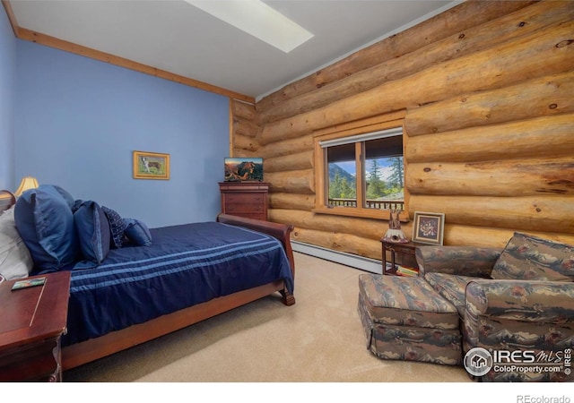95 Choctaw Rd, Lyons, CO 80540 - bedroom featuring rustic walls, baseboard heating, and carpet flooring
