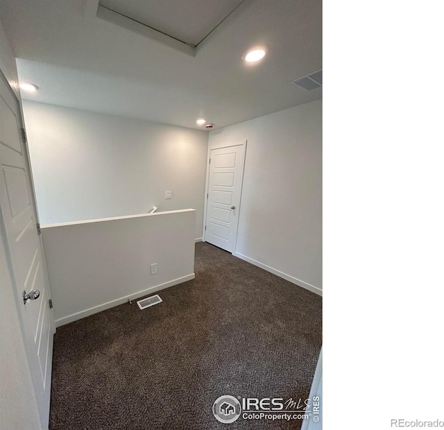 420 Condor Way, Johnstown, CO 80534 - unfurnished room featuring dark colored carpet, recessed lighting, and baseboards