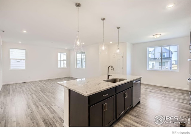 1875 Foggy Brook Dr, Fort Collins, CO 80528 - kitchen with a sink, dishwasher, light wood-type flooring, baseboards, and recessed lighting