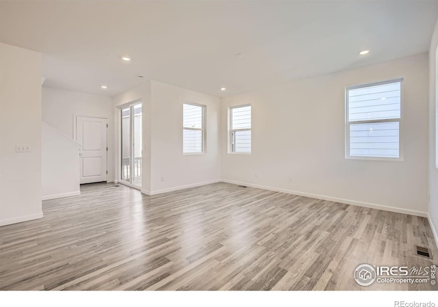 1875 Foggy Brook Dr, Fort Collins, CO 80528 - empty room with light wood-style flooring, baseboards, and recessed lighting
