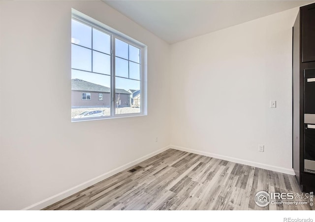 1875 Foggy Brook Dr, Fort Collins, CO 80528 - empty room with baseboards and light wood finished floors