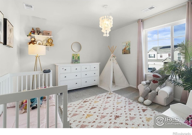 6229 Black Mesa Rd, Frederick, CO 80516 - bedroom with carpet floors, a chandelier, and baseboards
