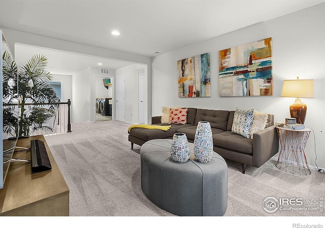 6229 Black Mesa Rd, Frederick, CO 80516 - living area featuring carpet, separate washer and dryer, baseboards, and recessed lighting