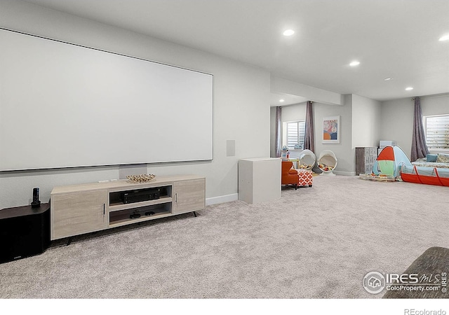 6229 Black Mesa Rd, Frederick, CO 80516 - home theater room with recessed lighting, carpet, healthy amount of natural light, and baseboards
