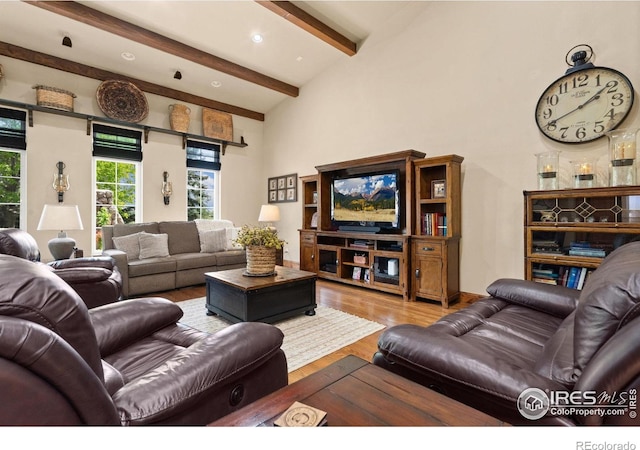 1738 S Estrella Ave, Loveland, CO 80537 - living area with wood finished floors, beam ceiling, and recessed lighting