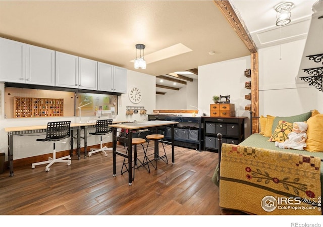 1738 S Estrella Ave, Loveland, CO 80537 - dining room featuring attic access and wood finished floors
