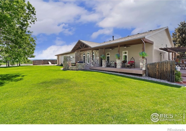 1738 S Estrella Ave, Loveland, CO 80537 - rear view of house with a ceiling fan and a wooden deck