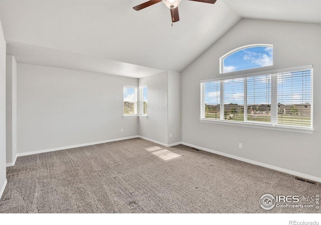 993 Ouzel Falls Rd, Severance, CO 80550 - spare room with ceiling fan, carpet floors, lofted ceiling, and baseboards