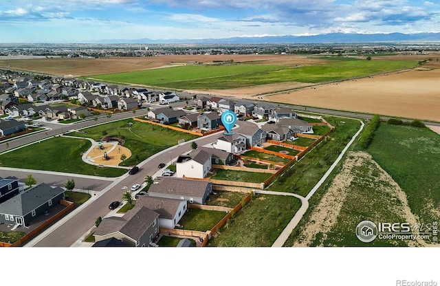 993 Ouzel Falls Rd, Severance, CO 80550 - aerial perspective of suburban area with a mountain backdrop