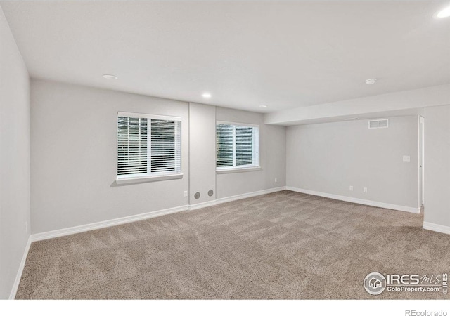 993 Ouzel Falls Rd, Severance, CO 80550 - unfurnished room with carpet floors, baseboards, and recessed lighting