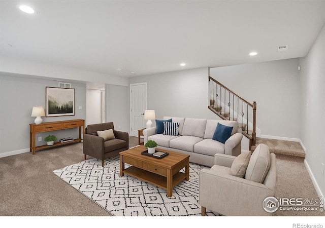 993 Ouzel Falls Rd, Severance, CO 80550 - carpeted living area with stairs and recessed lighting